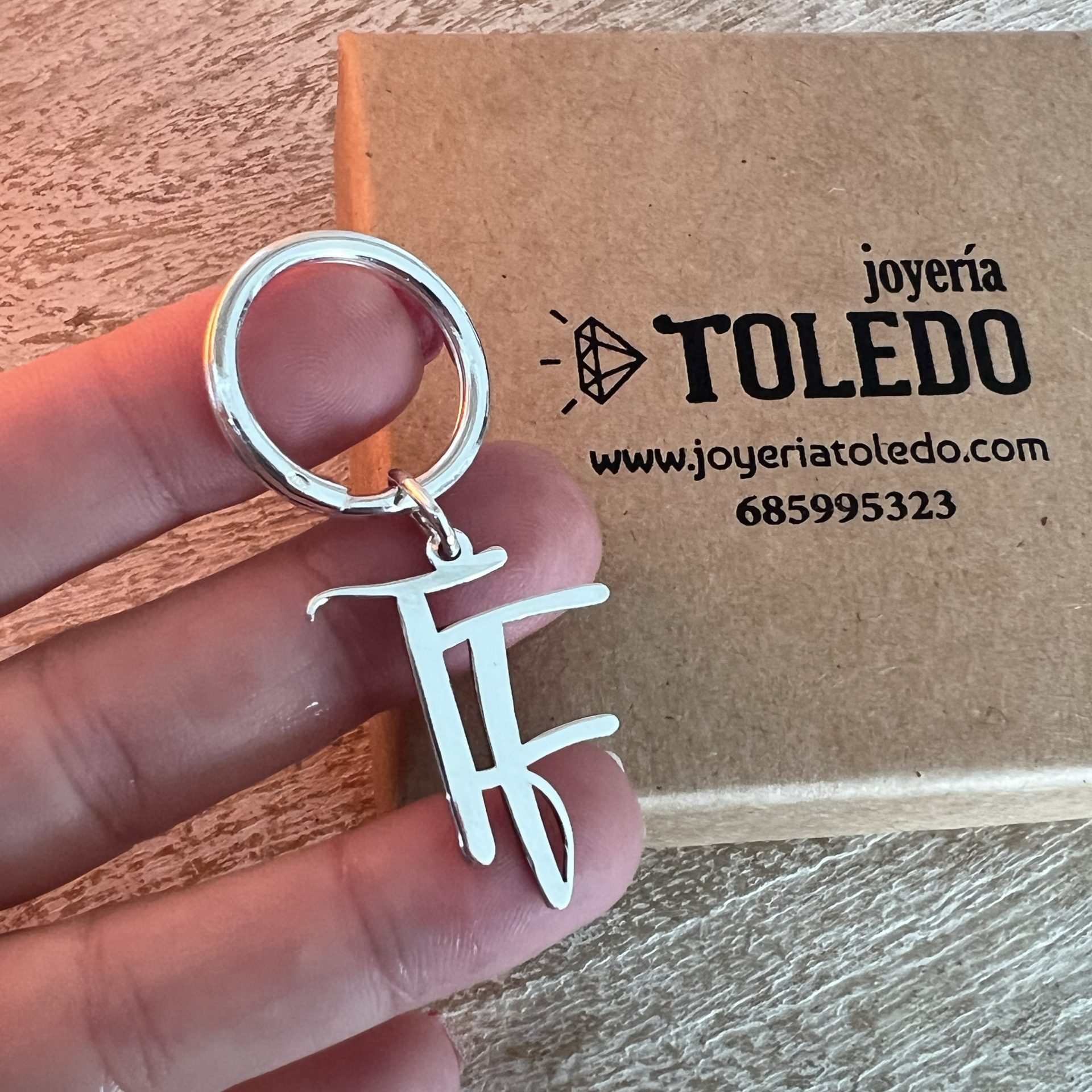 Llavero plata de ley iniciales siluetas